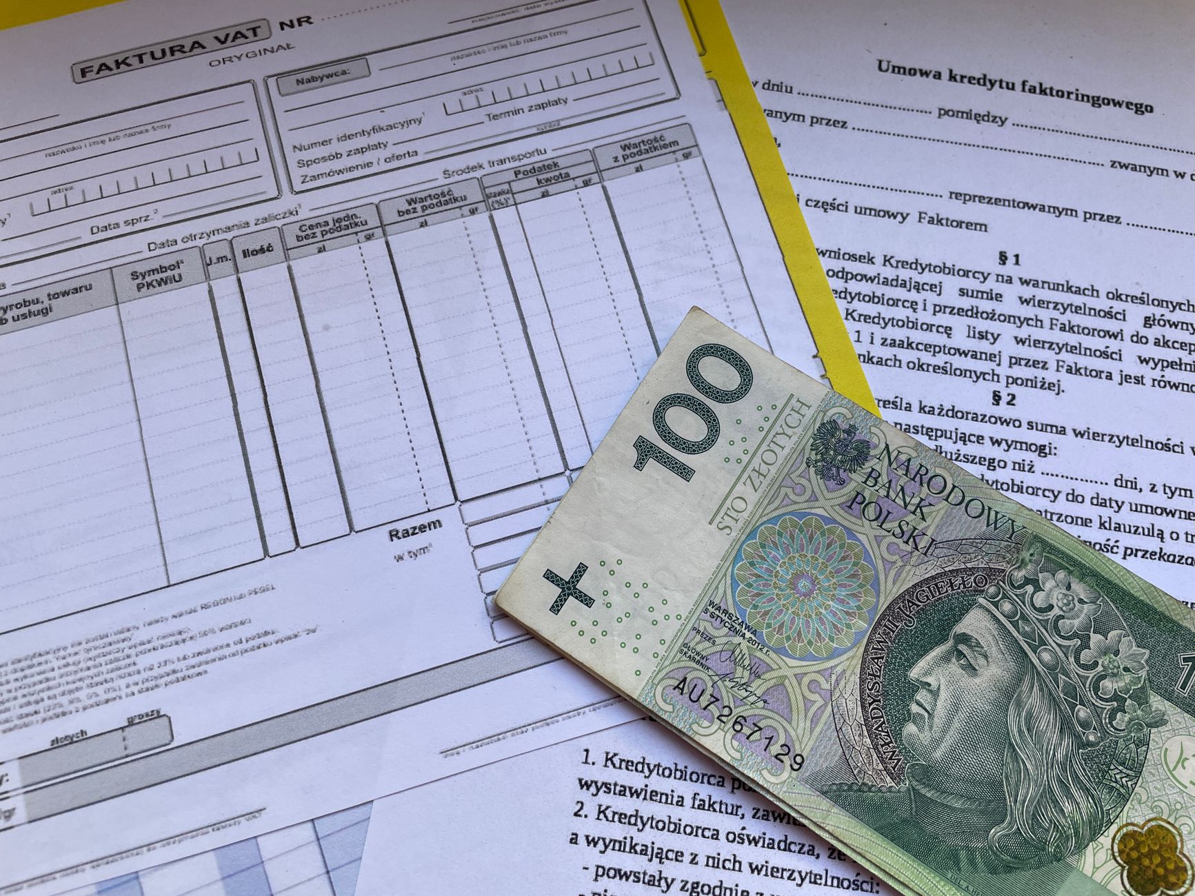 Currency documents and business records on desk, showing multi-currency management
